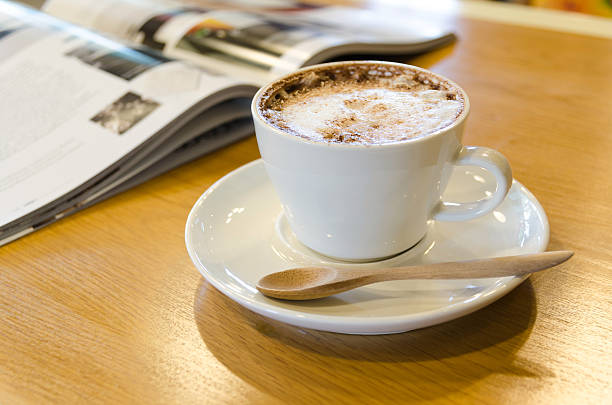 istock Cup of coffee on the table 464060433
