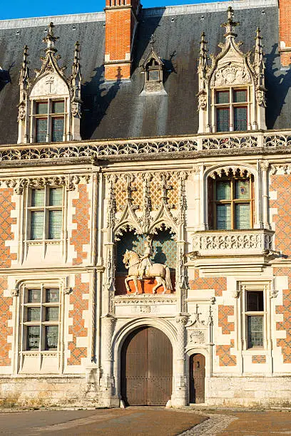 The chateau de Blois: the facade of the Louis XII wing. This old Royal palace is located in the Loire Valley in the center of the city of Blois, France.