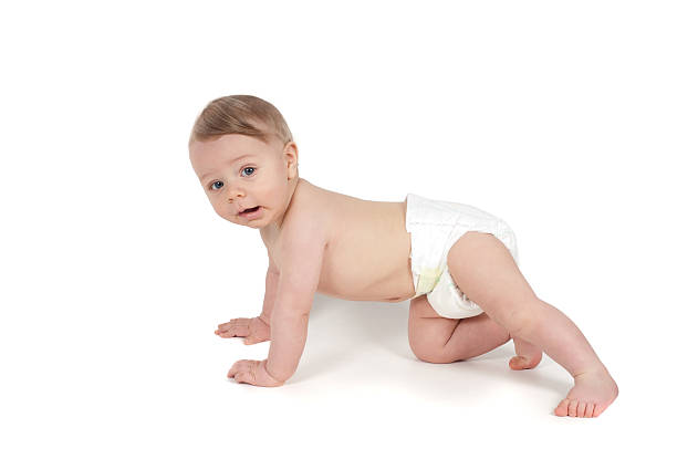 istock Side view of little crawling baby 464087491