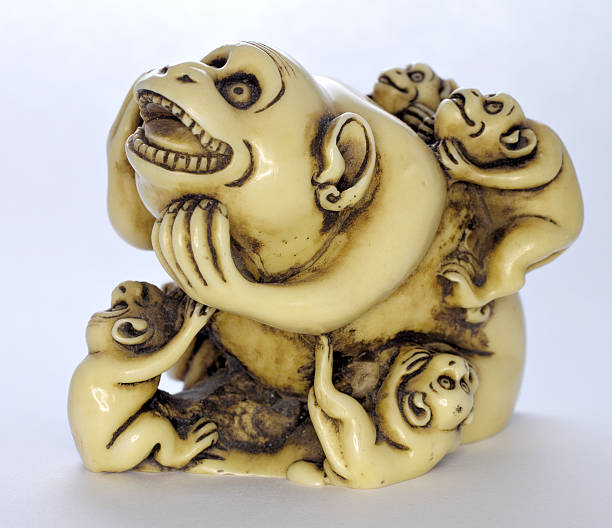 istock Six young monkeys on mothers back Japanese okimono imitation 464106507