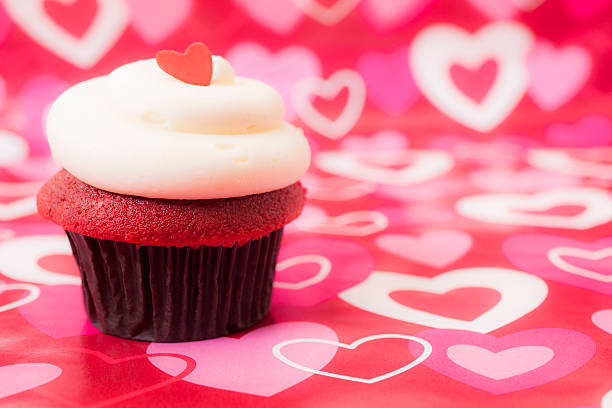 istock Valentine's Day: Cupcake with heart on top.  Pink and red. 464107135