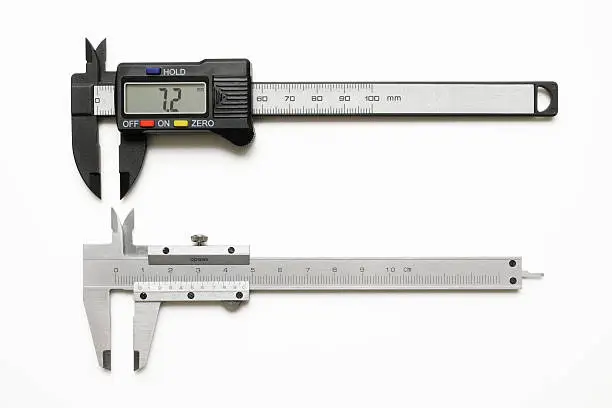 Opened two vernier caliper isolated on white background with vlipping path. 