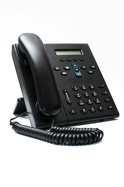 черный стационарный телефон на белом фоне - conference phone фотографии стоковые фото и изображения