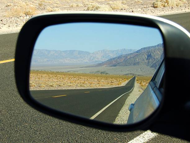 istock road in the mirror Death Valley 464153153