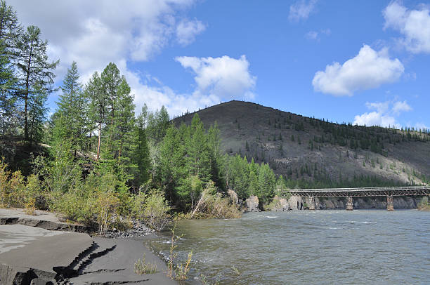 istock Bridge over the mountain river in Yakutia. 464156161