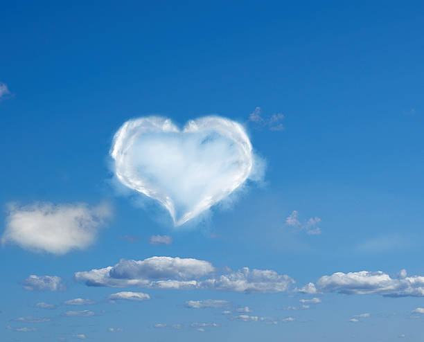 istock heart made of clouds against a blue sky 464160981