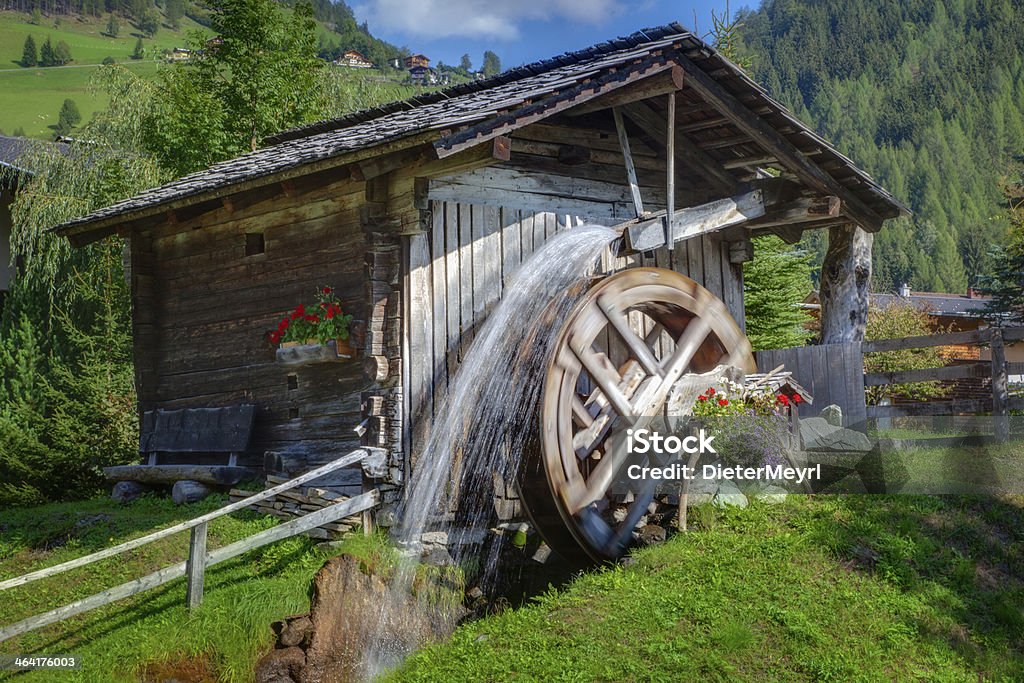 Idyllic Watermill Old mill wheel in austria, heiligenblut Watermill Stock Photo