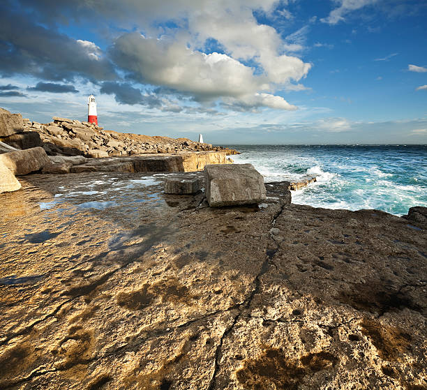 istock Portland Bill lighthouse on Dorset's Jurassic Coast 464176091