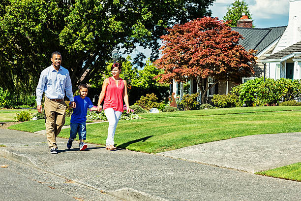 istock Happy Family of Three Going for a Walk 464178605