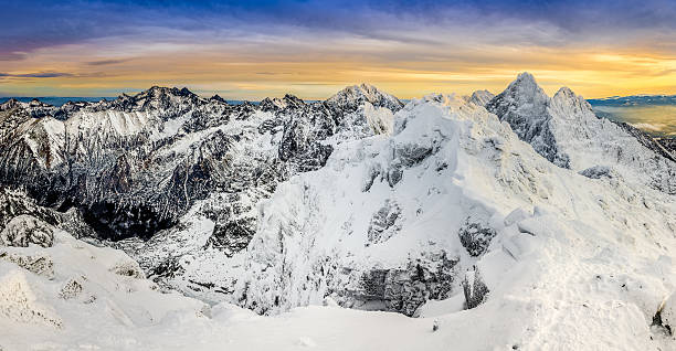 istock Panoramic view of winter mountains at colorful sunset 464190707