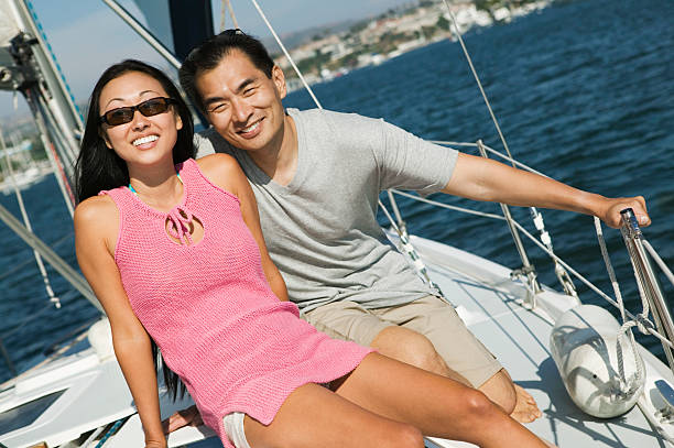 istock Couple on Sailboat 464200371