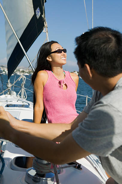 istock Couple on Sailboat 464200373