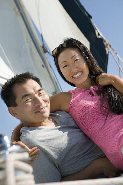 istock Couple on Sailboat 464200383