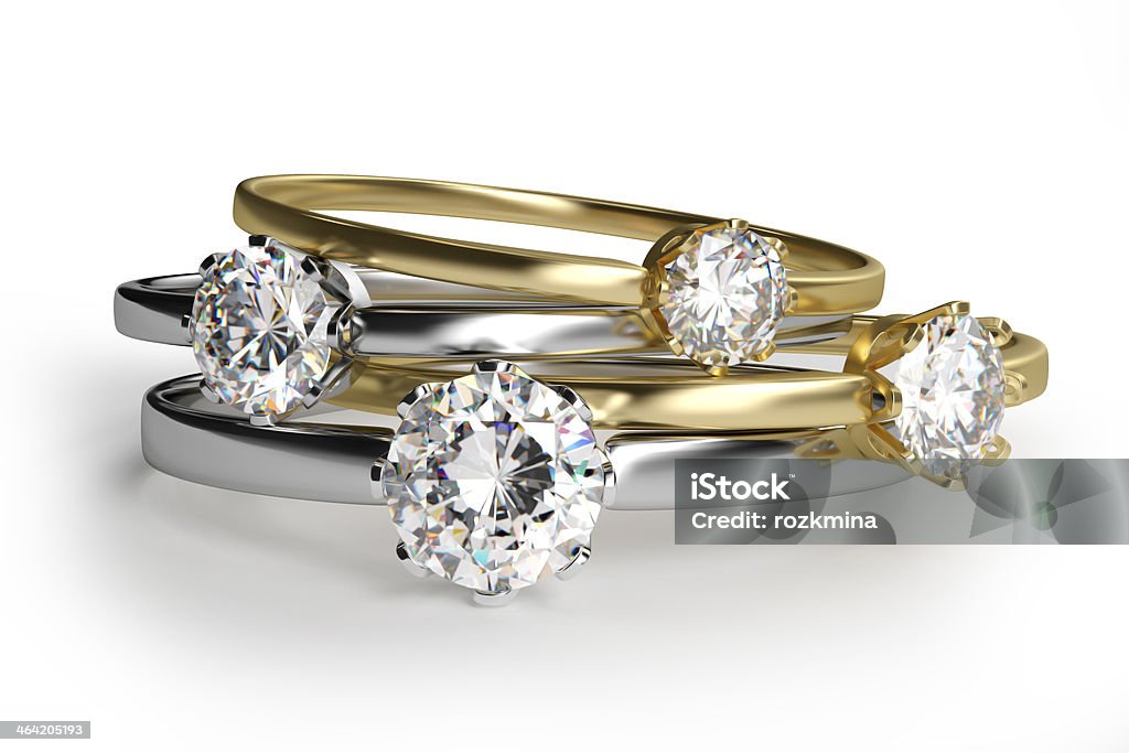 Close-up of assorted diamond rings in white background It's 3d render. If you need some extra personalized ilustration, feel free to contact me. I'll make it for you as fast as possible. email: info@pixelagestudio.com, www.pixelagestudio.com Jewelry Stock Photo