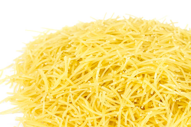 istock italian pasta (macaroni) isolated on white background 464205727