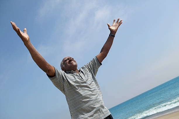 istock Very Happy Middle-Aged Man at Beach 464220123