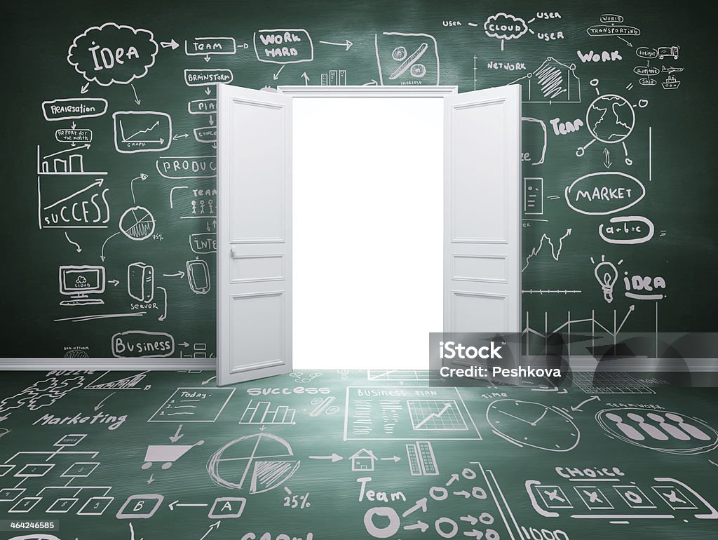 An open door in a room made of chalkboards opened door and drawing cocept Architecture Stock Photo