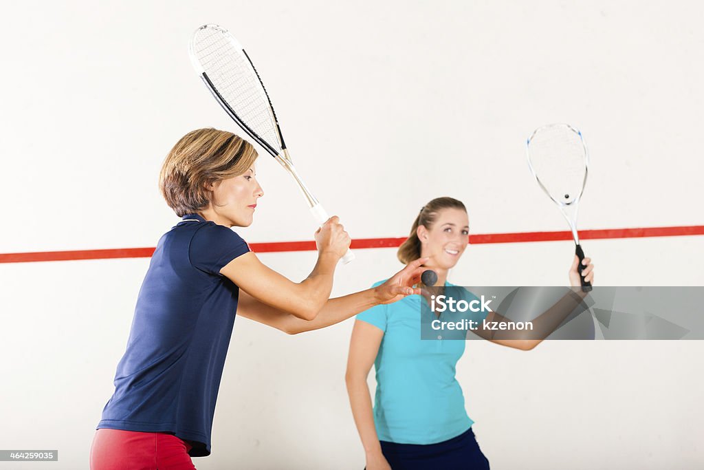 Abóbora Desporto com Raqueta no ginásio, as mulheres concorrência - Royalty-free Adulto Foto de stock
