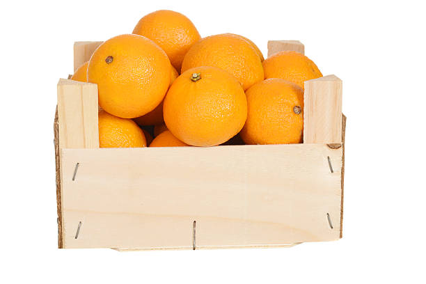 istock wood box of mandarin oranges 464272363
