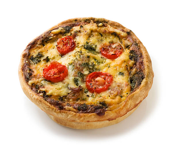 istock Cheese and tomato quiche isoalted on a white background 464277367