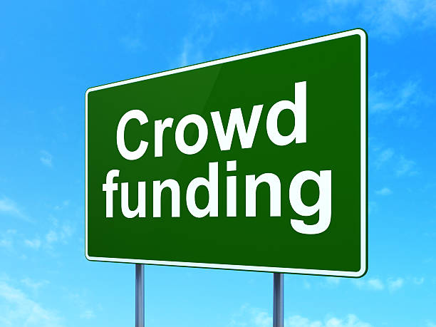 istock Finance concept: Crowd Funding on road sign background 464285897