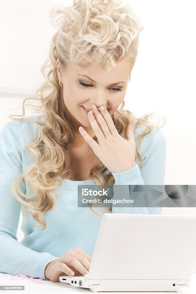 happy woman with laptop computer picture of happy woman with laptop computer Accessibility Stock Photo