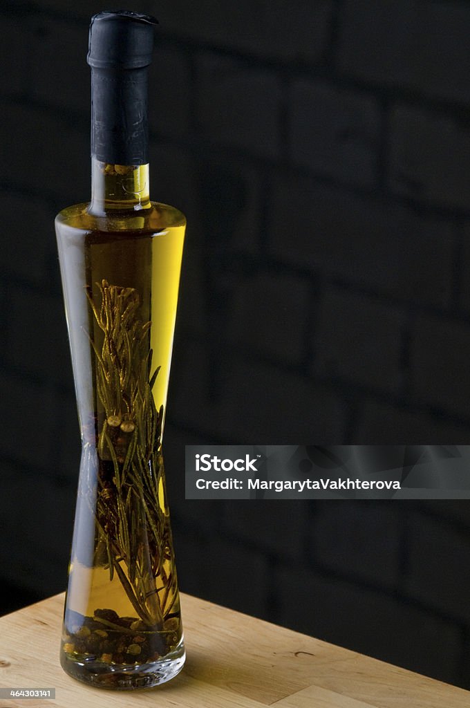 Olive oil bottle Olive oil bottle still-life over dark  background Bottle Stock Photo