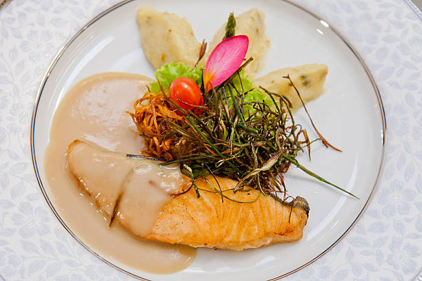 istock Salmon steak sauce gravy with mashed potatoes. 464305493