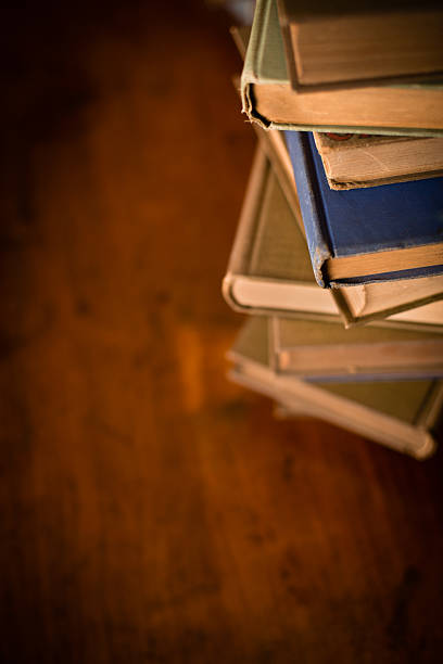 istock Vintage Books Sitting on Old Desk, With Copy Space 464319243