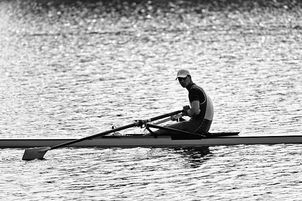 istock Sportsman resting after rowing single scull race 464319857