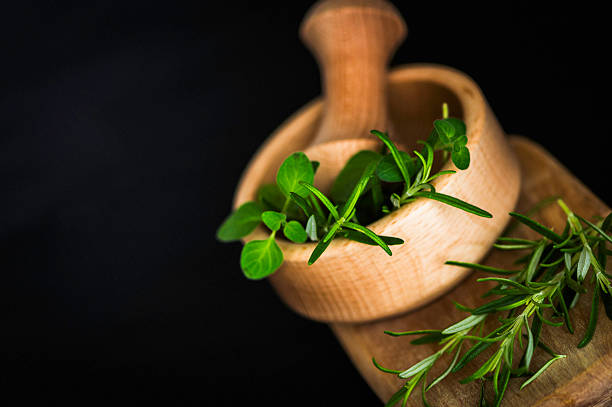 istock Fresh Organic Rosemary and Oregano in Mortar 464344771