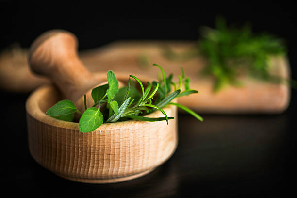 istock Fresh Organic Rosemary and Oregano in Mortar 464344783