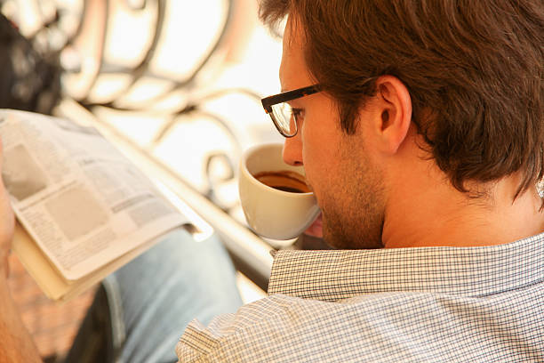 istock Young man enjoying in cafe 464354933