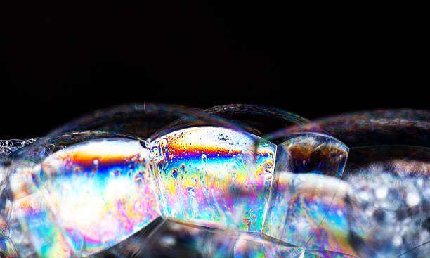 istock Soap bubbles abstract colorful background vibrant color 464355433