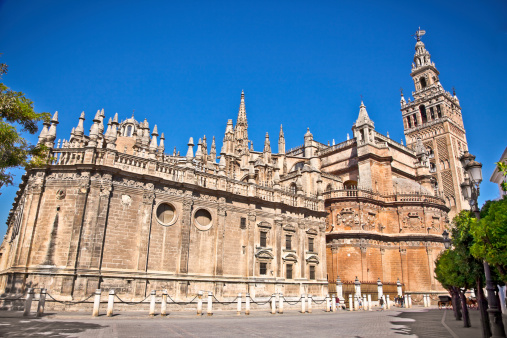Cathedral of Saint Mary  (Catedral de Santa Maria de la Sede) in Seville, Spain. Its bell tower called La Giralda.
