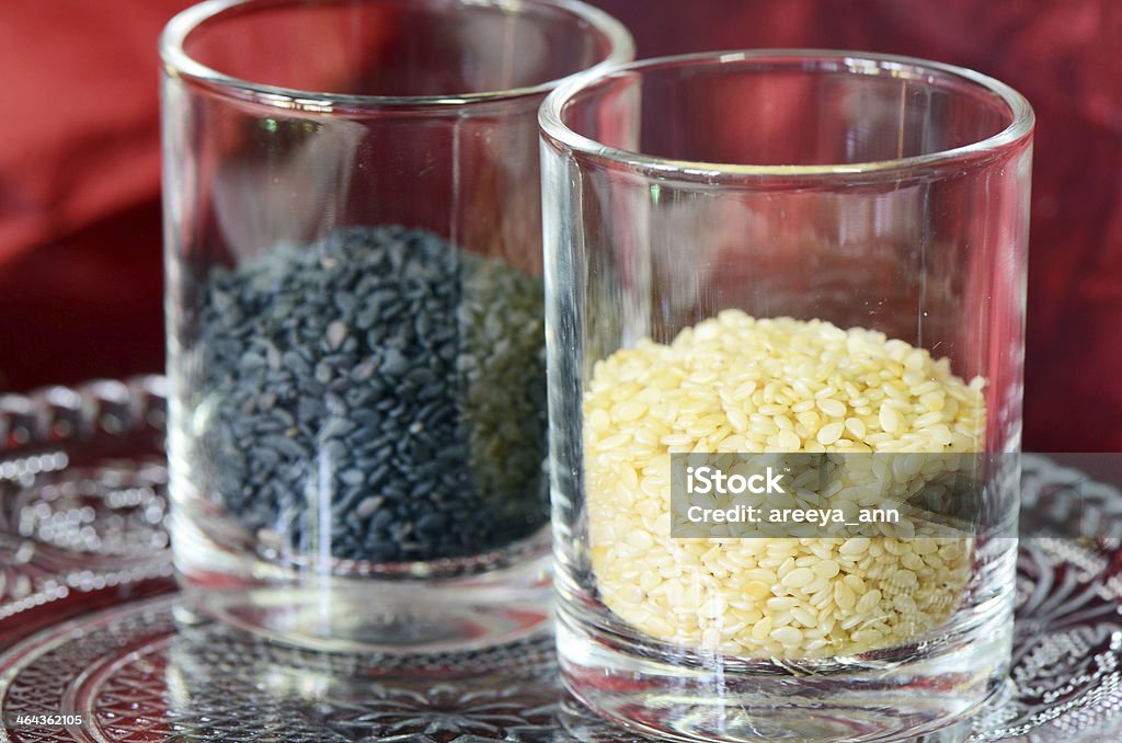 Black and White Sesame. Sesame Seeds in Cocktail Glass. Asian Culture Stock Photo