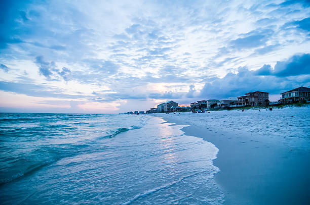 istock sunset on florida beach with white sand and blue sky 464363409