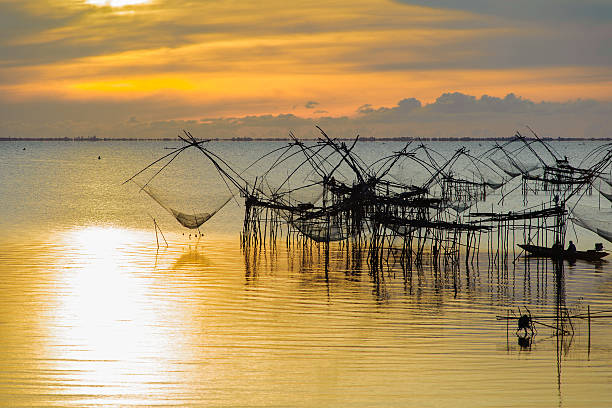 istock Fisherman and the sea, Thailand 464364203