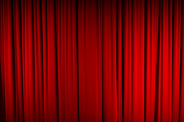 Color Image of Closed, Red Stage Curtain stock photo