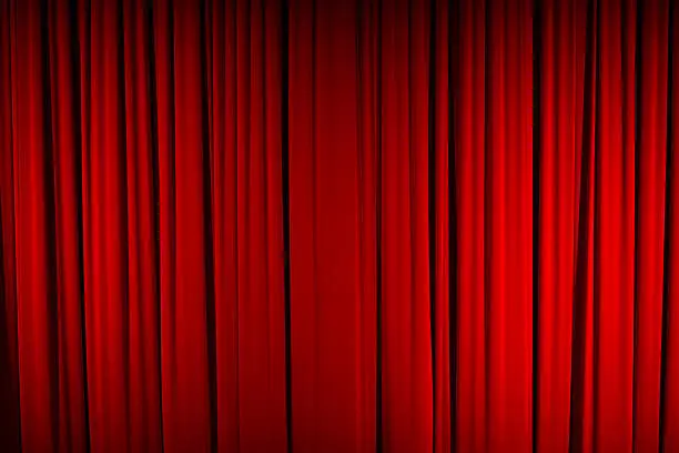 Photo of Color Image of Closed, Red Stage Curtain