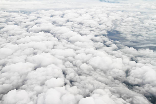 istock Clouds. view from the window of an airplane 464375583