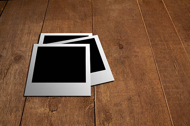 istock Polaroid on the wooden floor 464378261