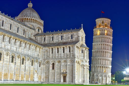 Pisa tower at night is Tuscany, Italy.