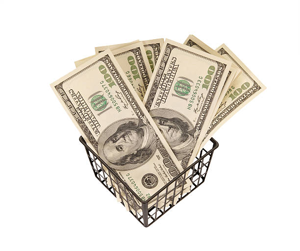istock Hundred dollar bills money in the basket 464386193