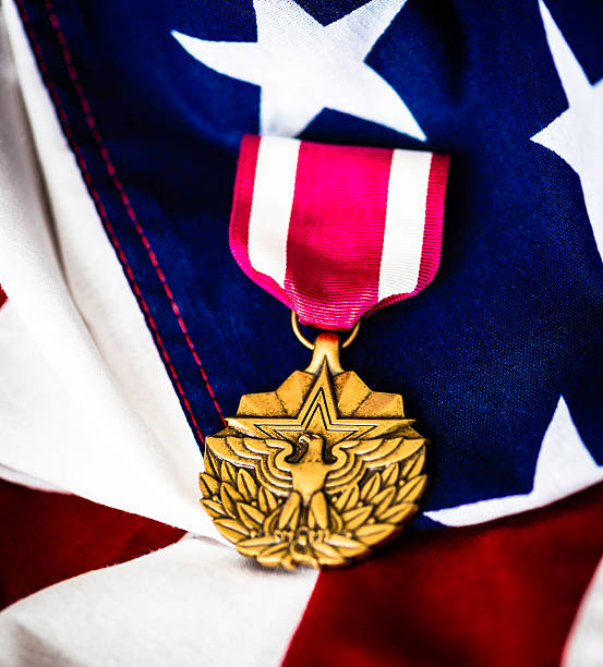istock Military Meritorious Service Medal on American Flag 464388305