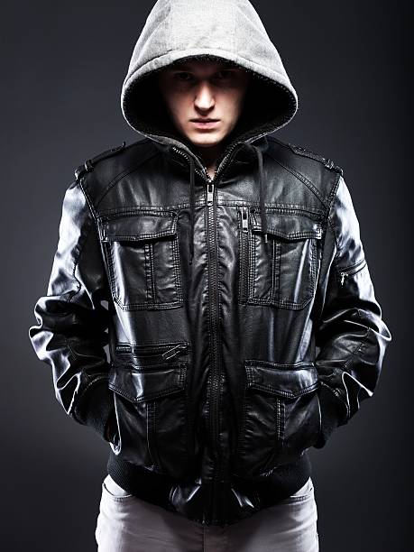 istock Young man in leather jacket with hood 464391723