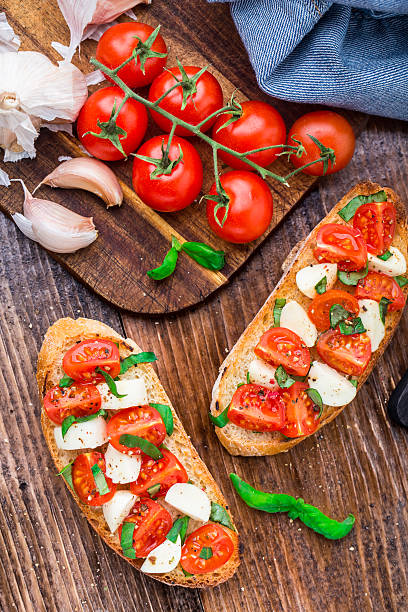 istock Bruschetta with cherry tomato and mozzarella 464394252