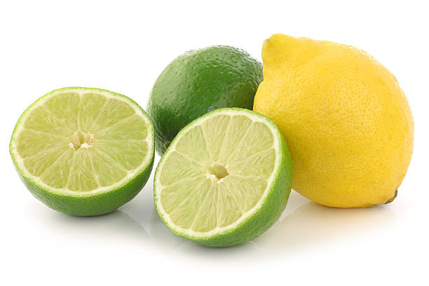 istock colorful fresh lime ,lemon fruit and a cut one 464394759