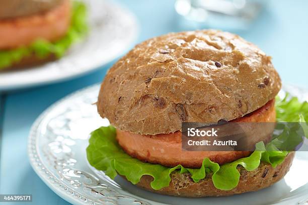 Salmon Fishburger Sandwich Stock Photo - Download Image Now - Bread, Fish Cakes, Wholegrain