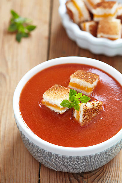 istock Grilled Cheese Croutons in Roasted Tomato Soup 464395183